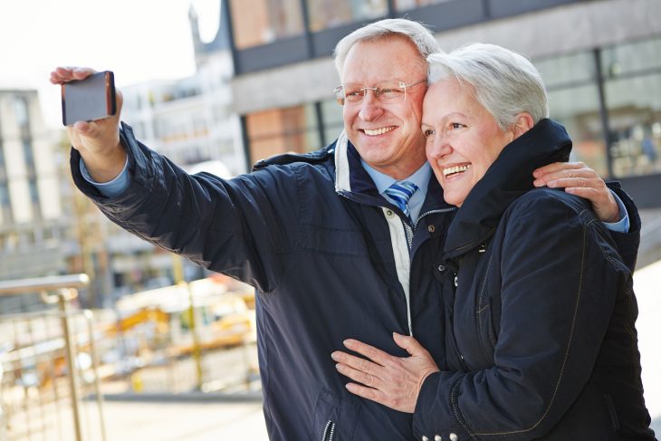 bigstock-Happy-senior-couple-taking-pic-45705646.jpg