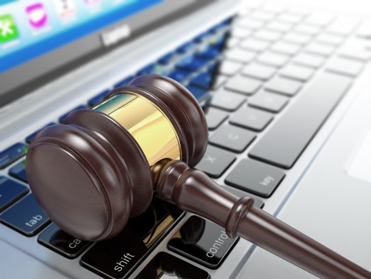bigstock-Online-auction-Gavel-on-lapto-52894363.jpg