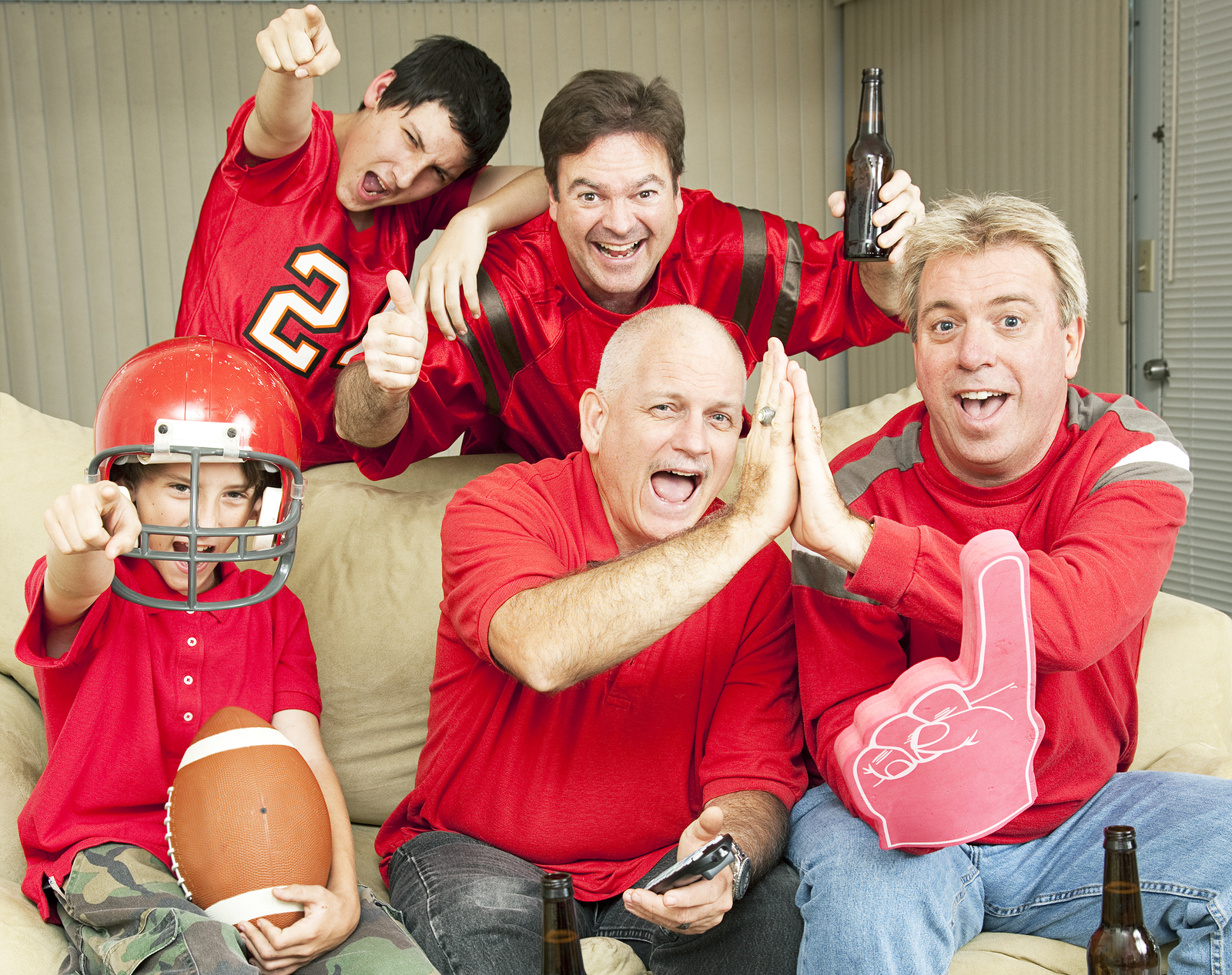 bigstock-American-football-fans-get-tog-13594076.jpg
