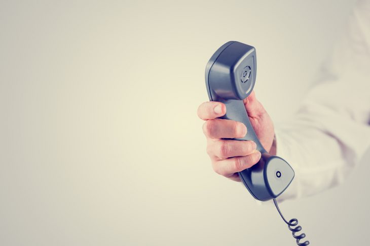 bigstock-Holding-Telephone-Receiver-67709962.jpg