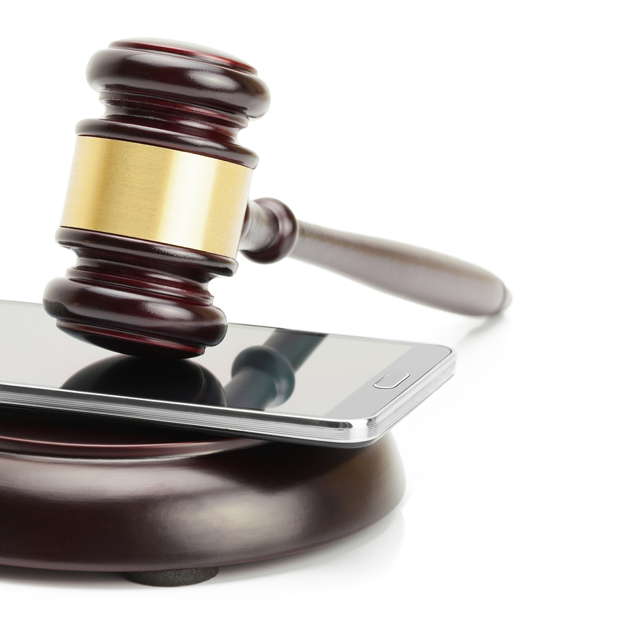 bigstock-Smartphone-Between-Judge-Gavel-72174223.jpg