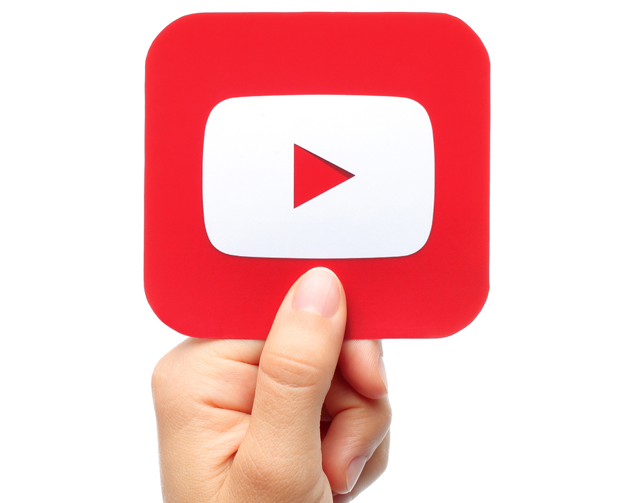 bigstock-Hand-holds-YouTube-icon-110234594.jpg