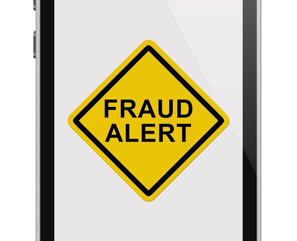 bigstock-Cell-Phone-With-Fraud-Alert-Me-65706055.jpg