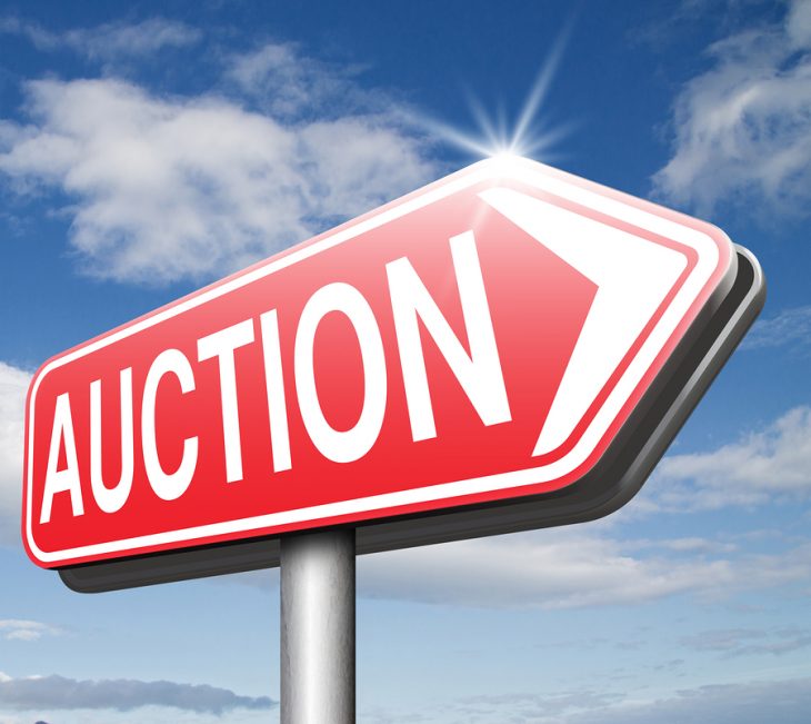 bigstock-Online-auction-sign-bid-and-bu-72090301.jpg