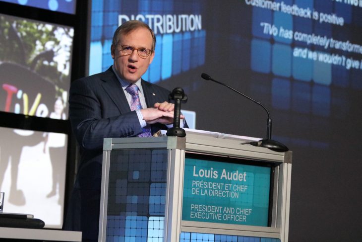 Audet at podium.JPG