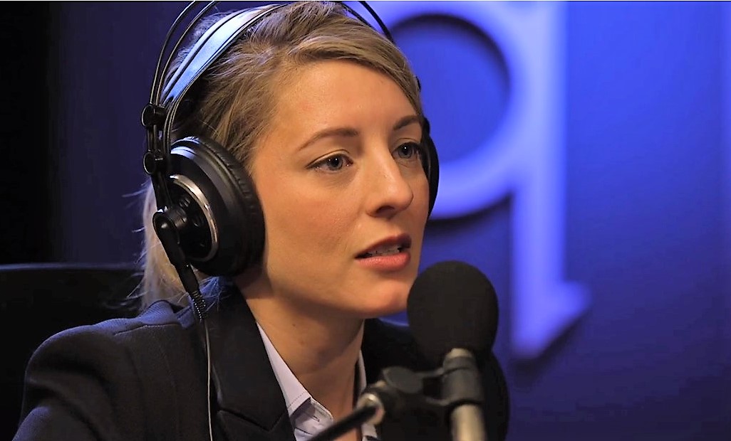 joly on q with logo.jpg