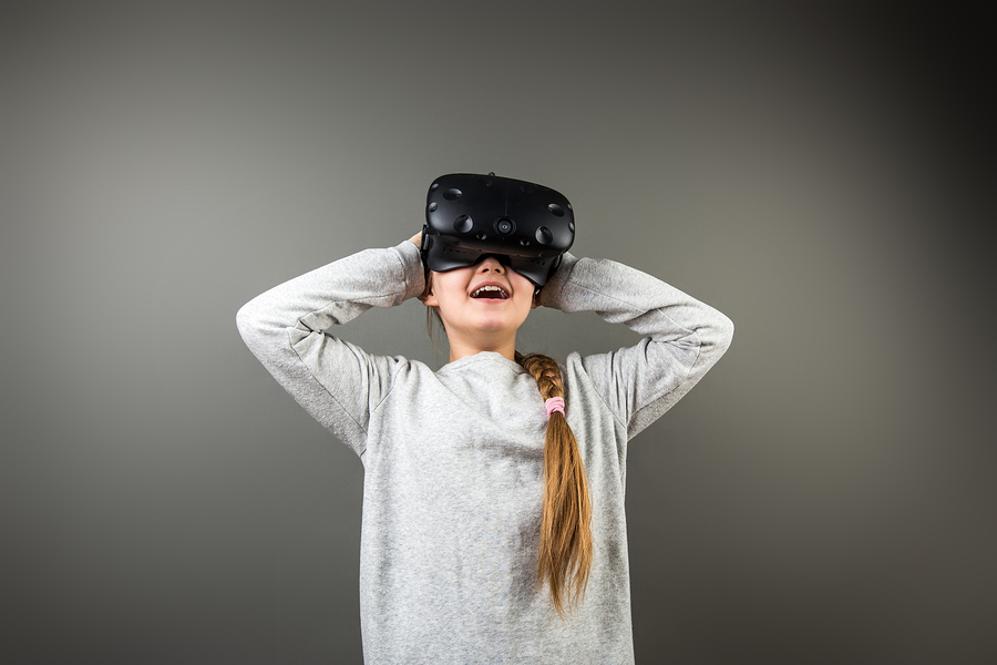 bigstock-Girl-Wearing-Virtual-Reality-G-198130792.jpg