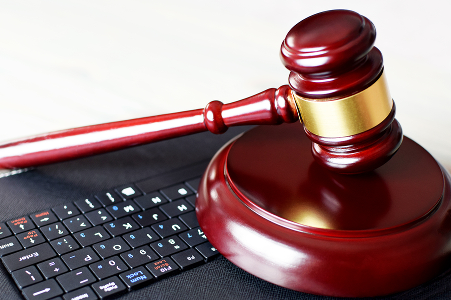 bigstock-Wooden-Judge-Gavel-On-Keyboard-291800794.jpg