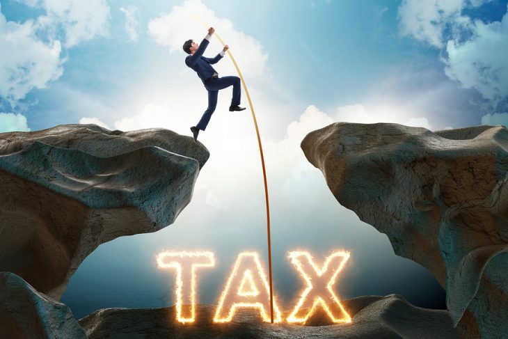 bigstock-Businessman-in-tax-payment-con-299718166.jpg